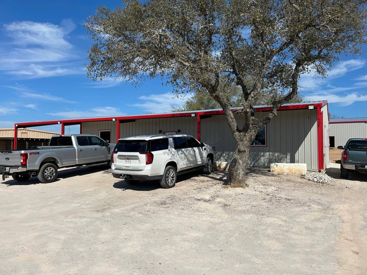 The red-trimmed 4-T Rental & Sales office building at 14831 TX-29 in Buchanan Dam, TX