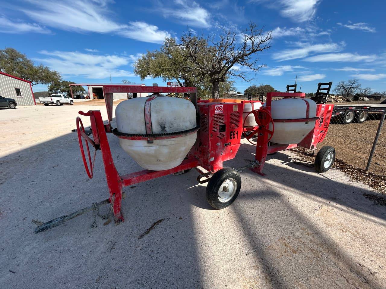 Red Multiquip towable mortar and concrete mixers on the 4-T Rental & Sales yard