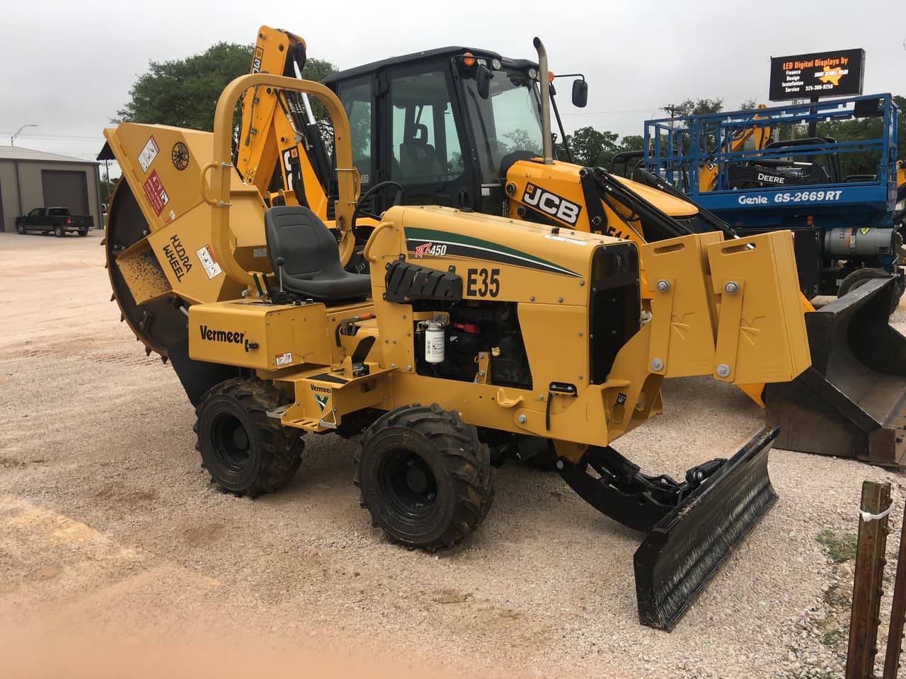 Vermeer RTX450 trencher with rock wheel cutting attachment and backfill blade